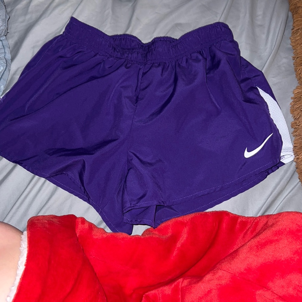 Purple Nike athletic shorts, size medium